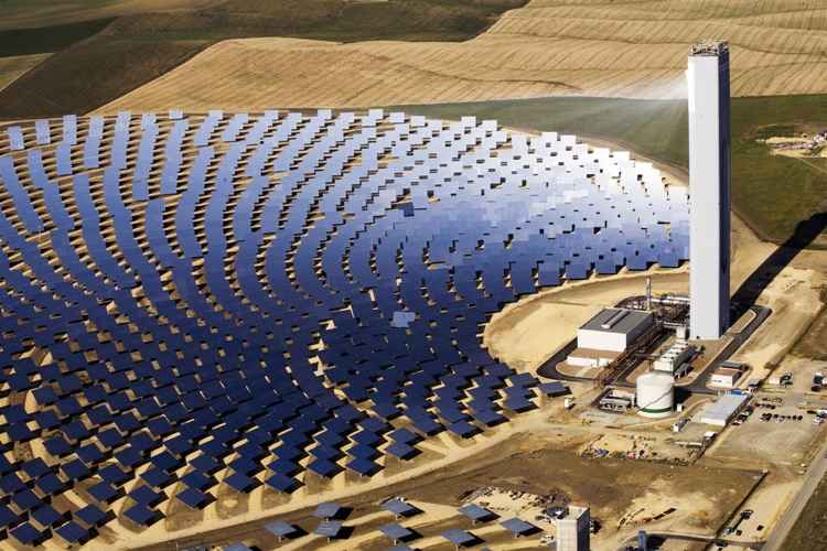 Concentrated Solar Power (CSP) systems use mirrors or lenses to focus sunlight onto a small area, usually a receiver. This concentrated heat energy heats a fluid, which produces steam to drive a turbine connected to a generator, thus generating electricity. Common CSP setups include parabolic troughs, solar power towers, and dish Stirling systems. CSP plants often include thermal storage, allowing electricity generation even when sunlight is not available.